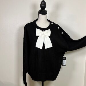 Authentic Karl Lagerfeld Black Knit Sweater with White Bow and jeweled buttons
